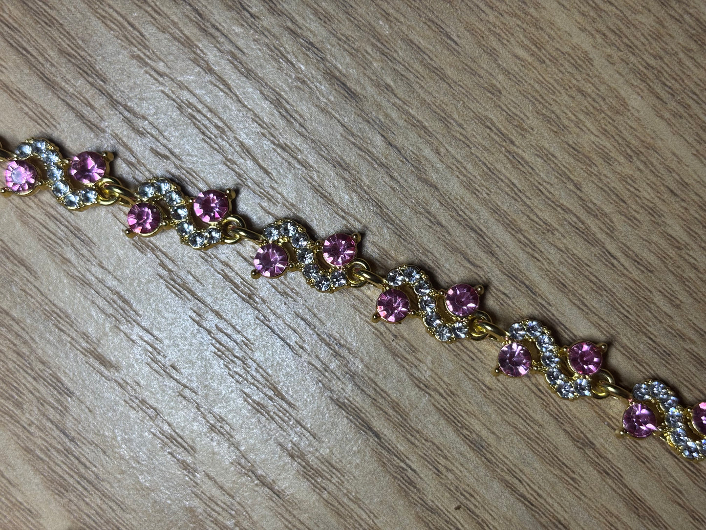 Stunning Gold and Pink Tennis Bracelet