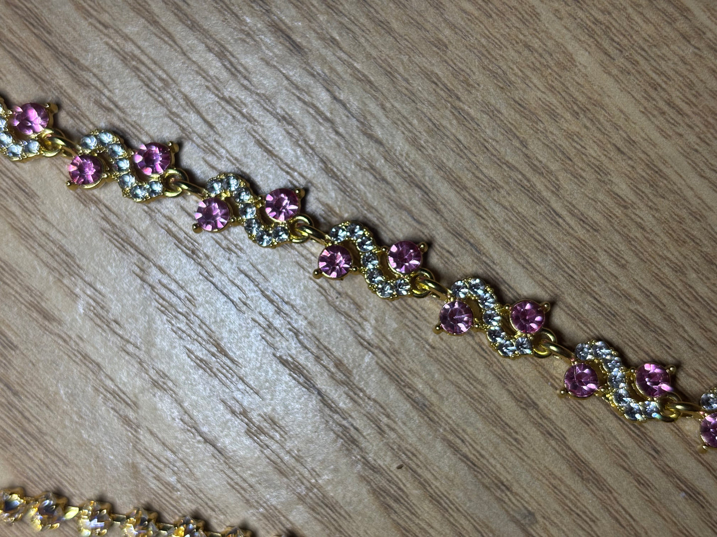 Stunning Gold and Pink Tennis Bracelet