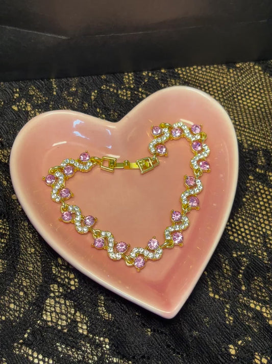 Stunning Gold and Pink Tennis Bracelet